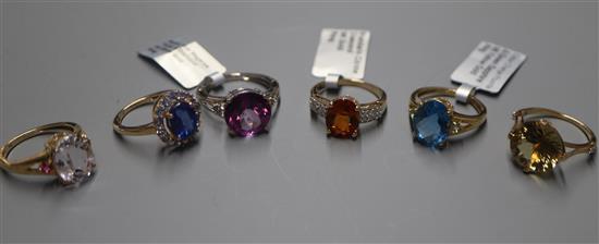 A 9ct white gold and mystic pink topaz ring and five 9ct yellow gold dress rings including a mandarin citrine example